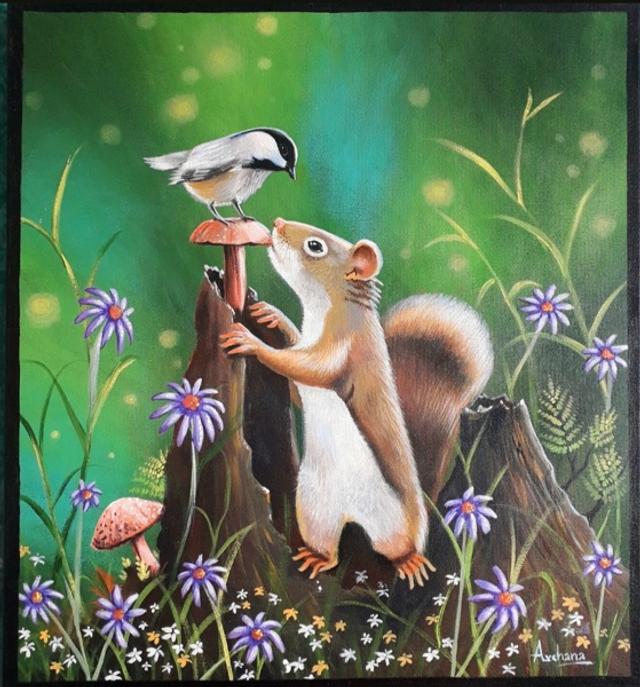 Squirrel enjoying play with bird.