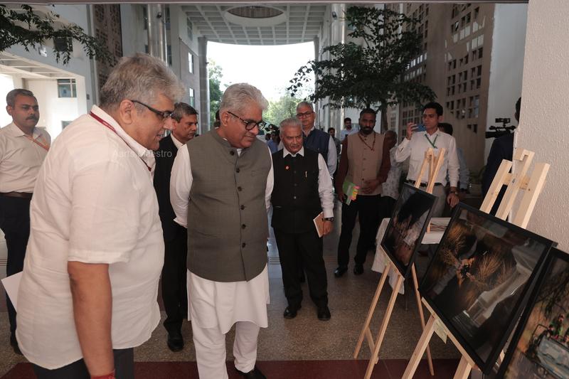 Hon. Minister viewing the photography exhibition